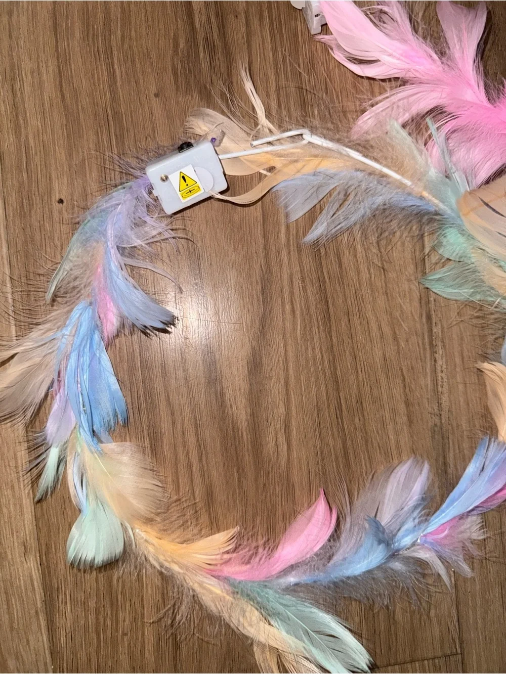 Brand new pack of 4 feather light up rave head bands